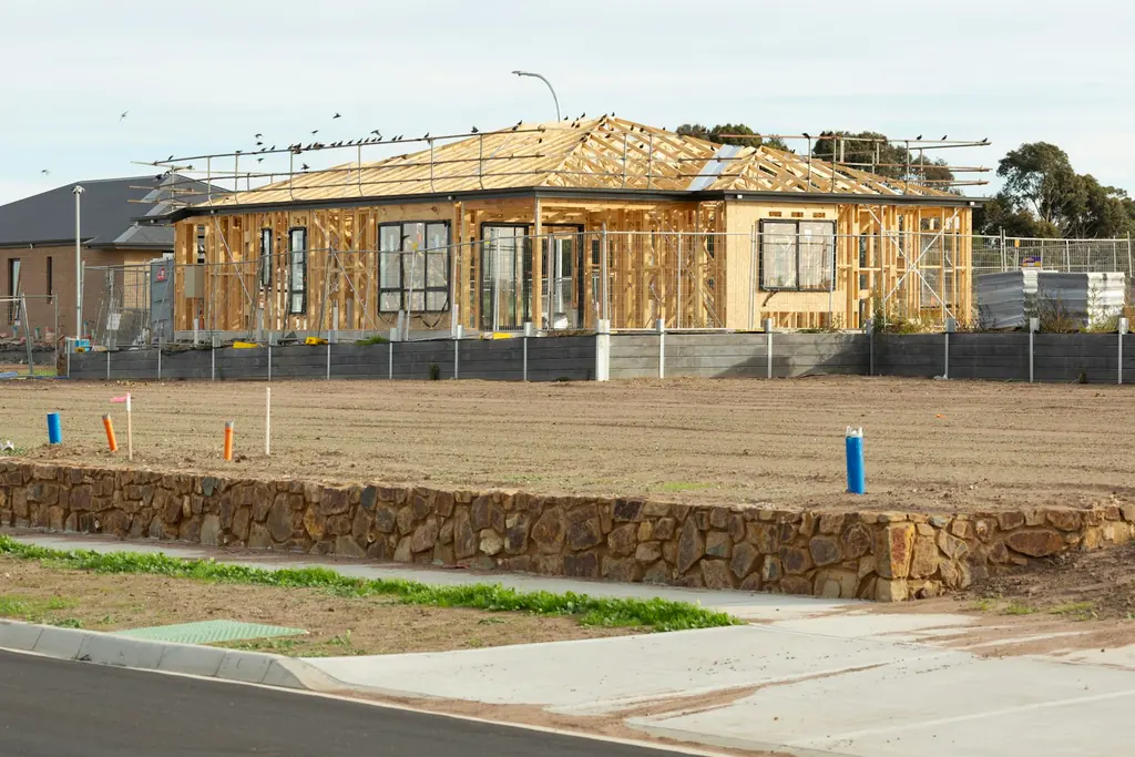 Australian residential construction with exposed timber framing and roof trusses